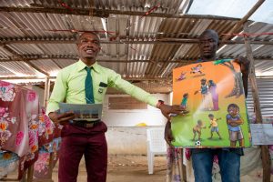 Pastor shares gospel using colourful picture guide